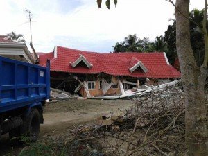 Image courtesy Julie Jaramillo - damaged house in Sagbayan